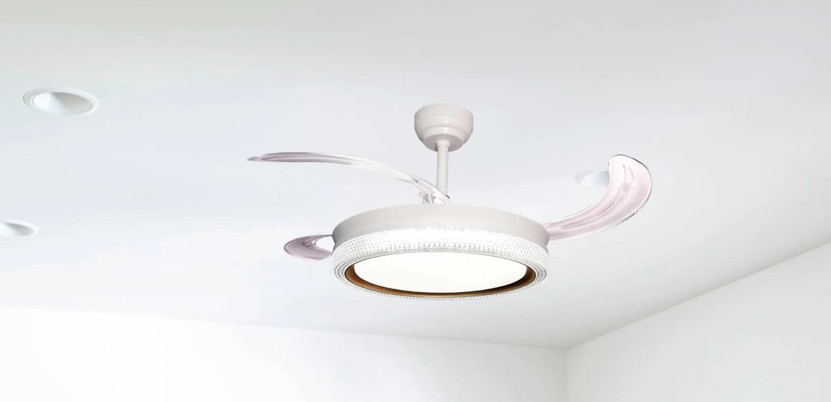 A white GoldRay chandelier fan with blades extended on a bright ceiling